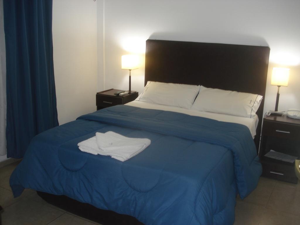 Morada Suites Campana Habitación foto